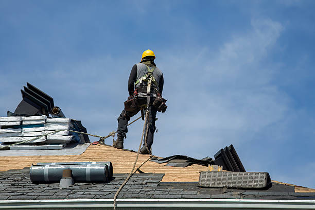 Professional Roof Replacement technician working in Frederick, OK
